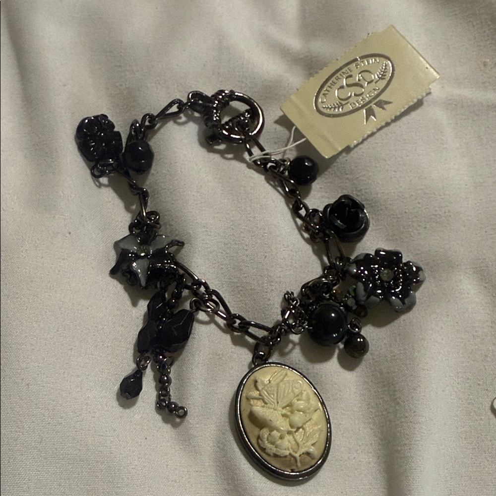Chic Black and Cream Charm Bracelet